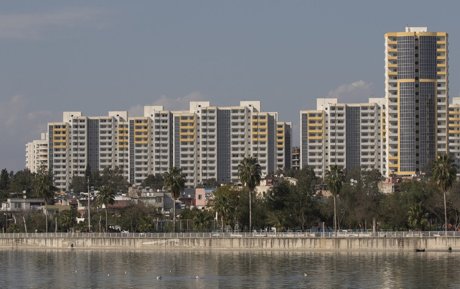 TOKİ public housing tower blocks along a waterfront