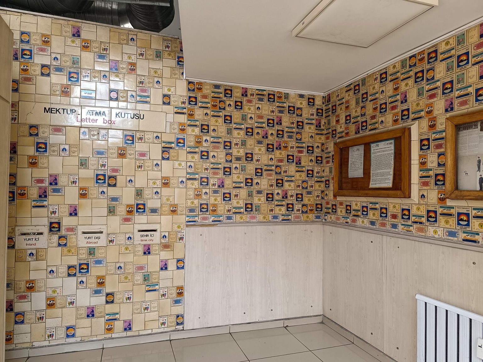 Interior of the Konak PTT post office in Izmir with rows of post office boxes