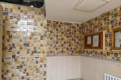 Interior of the Konak PTT post office in Izmir with rows of post office boxes