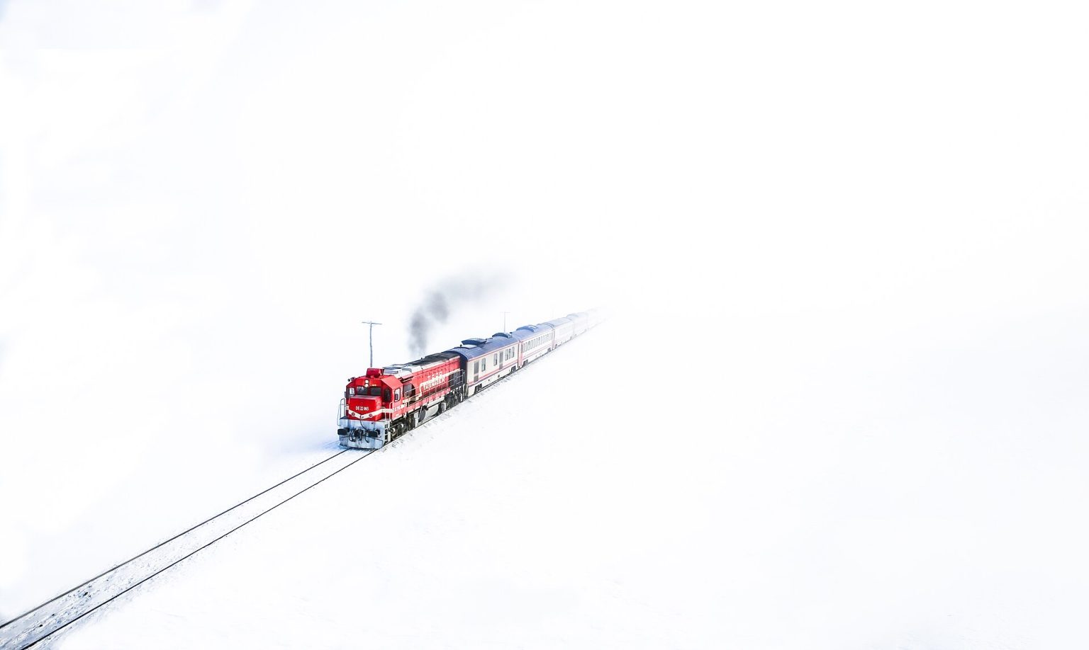 Eastern Express passenger train crossing a snowy landscape