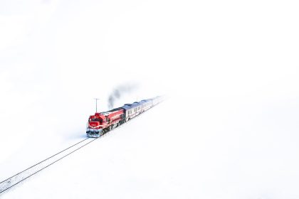 Eastern Express passenger train crossing a snowy landscape